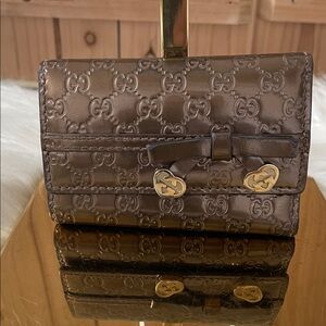 Gucci Metallic Brown Embossed GG Leather Bow Wallet with Gold Accents